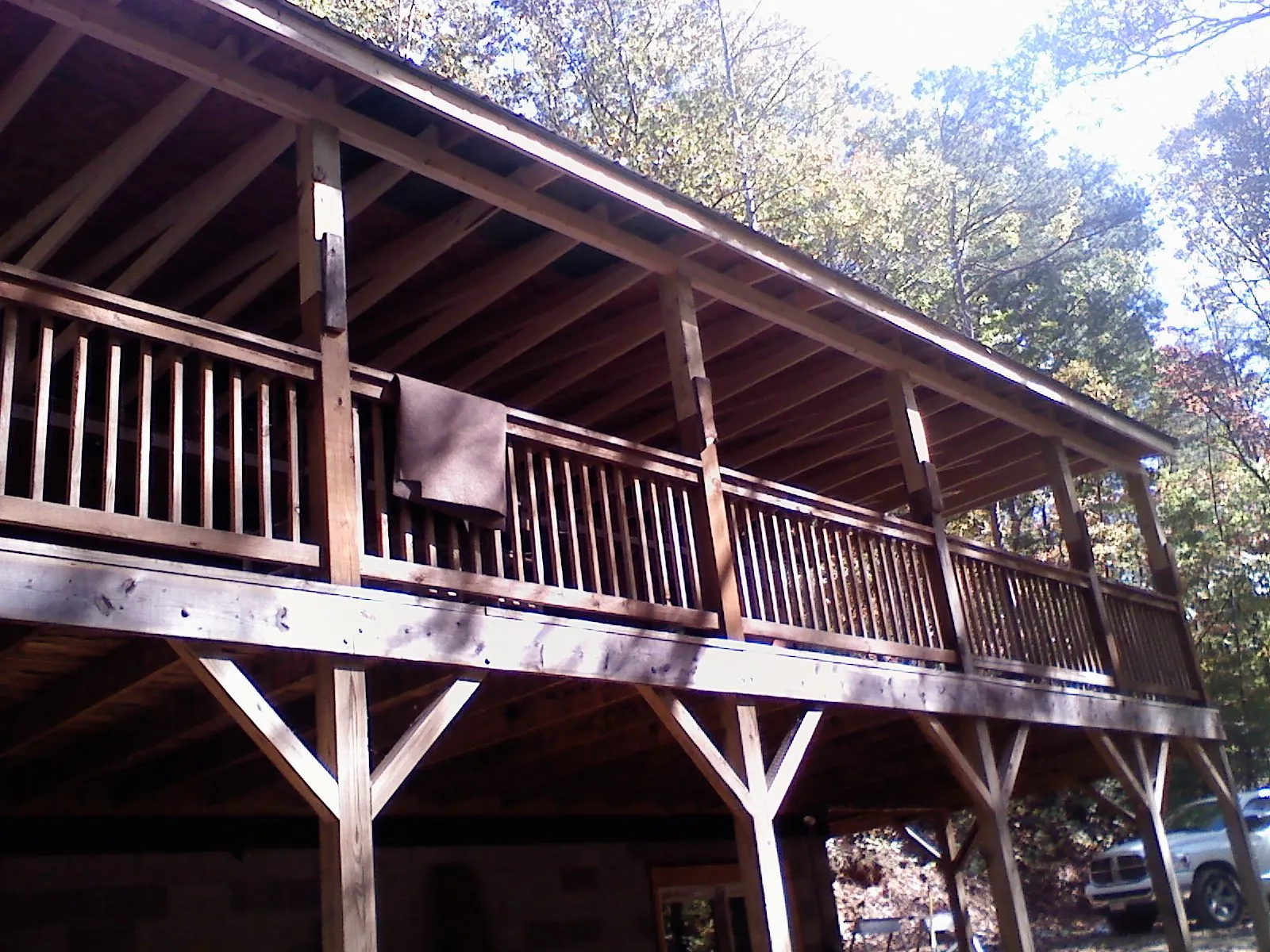 Timber framing under a new elevated porch and deck — Roof Leak Repair in Linesville by Roofing Brothers